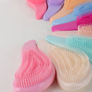 Escova Antiestética de Cabelo.